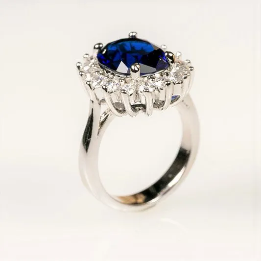 Katie Royal Sapphire 12mm Oval Halo Engagement Ring | 6.5ct